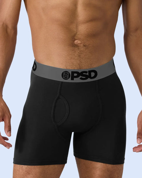 Black boxer briefs with grey waistband featuring PSD logo and front pouch detail.