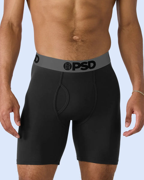 Black boxer briefs with grey waistband featuring PSD branding and logo.